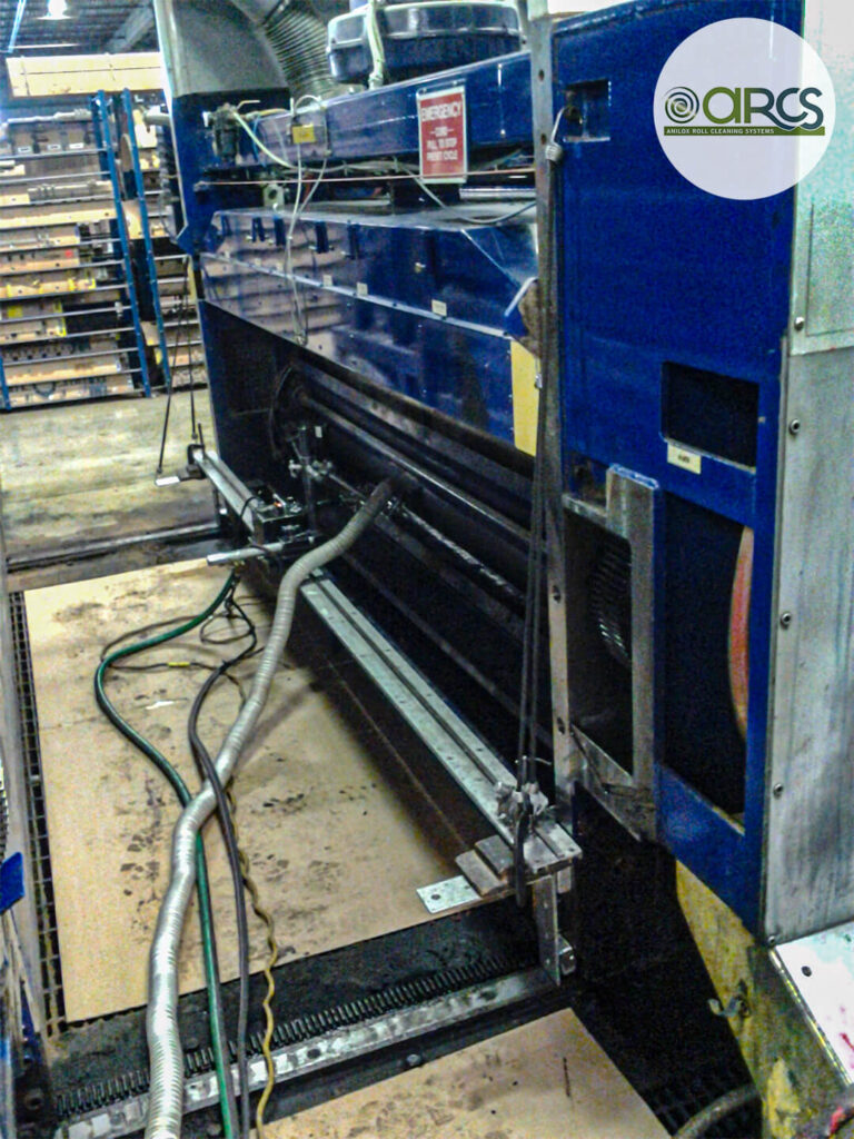 Picture of our on-press soda blast system in action