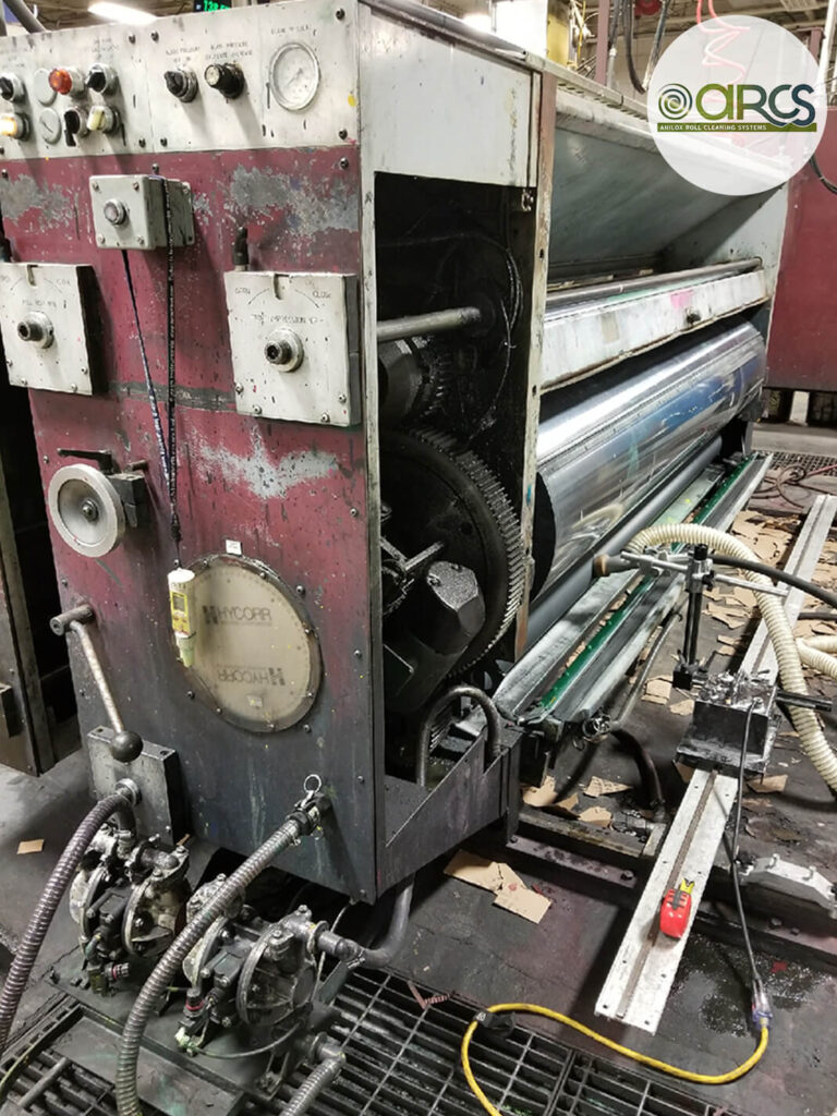 Picture of our on-press soda blast system in action