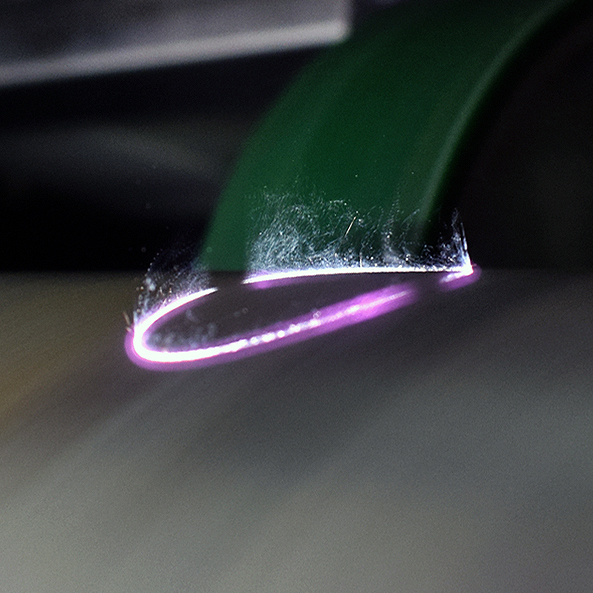Close up picture of our laser system in action